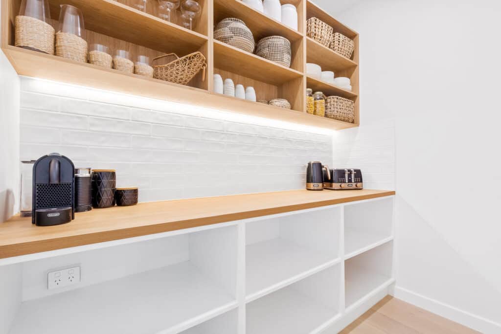 Butler's pantry with open timber shelving in a FEZ design and build home