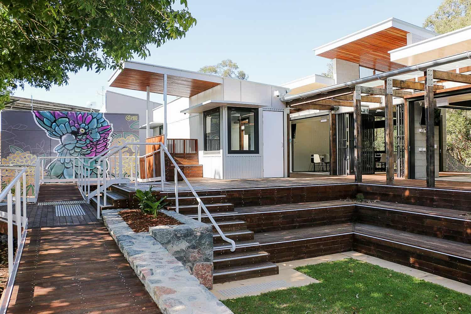 Townhouses with timber pergolas and landscaped stairs
